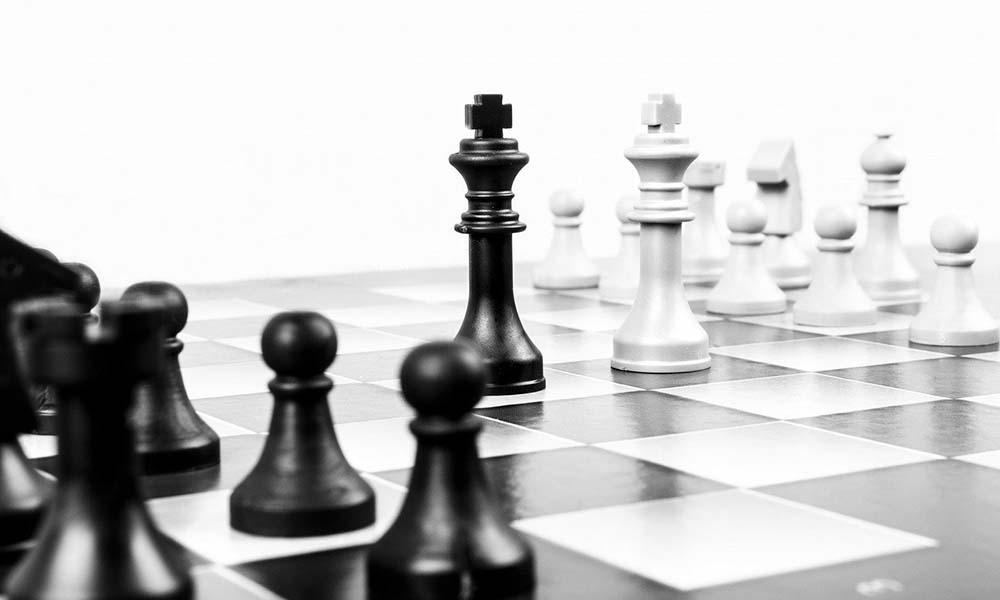 success-chess-board-pawn-king-queen-featured in the image to portray a success story